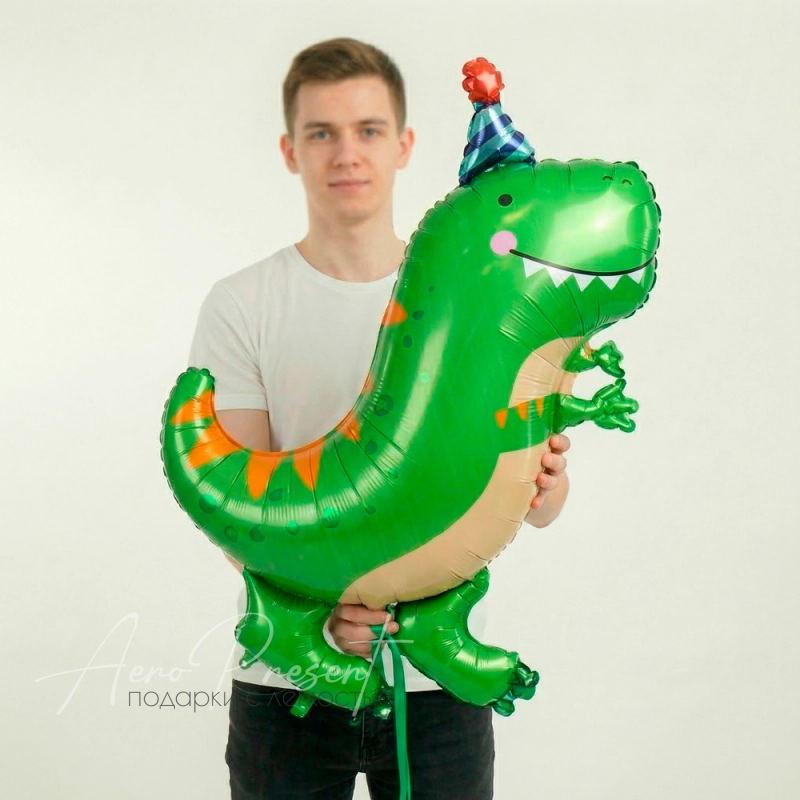 Динозавр зеленый в колпачке, фольгированный шар