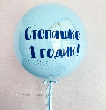 Голубой стеклянный гигант с надписью